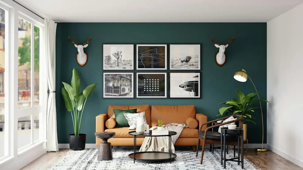 Finished living room with a painted accent wall and wood floors